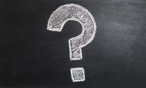 Stock photo of a question mark drawn on a chalkboard