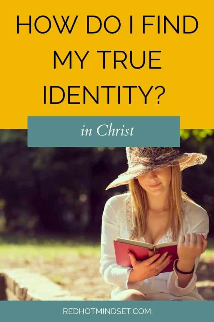 Pinterest image of woman sitting in the grass reading a book with the title how do I find my true identity in Christ