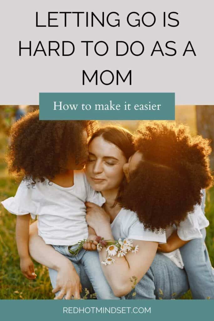 Pinterest image of a mom holding tightly to her two kids with the title holding loosely to your kids is hard as a mom