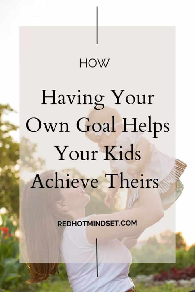 mom raising her baby above her head with title reading having your own goal helps your kids achieve theirs