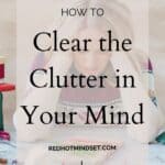 underlay picture of woman sitting at the table with a ton of clutter with hands on her face in frustration titled how to clear the clutter in your mind