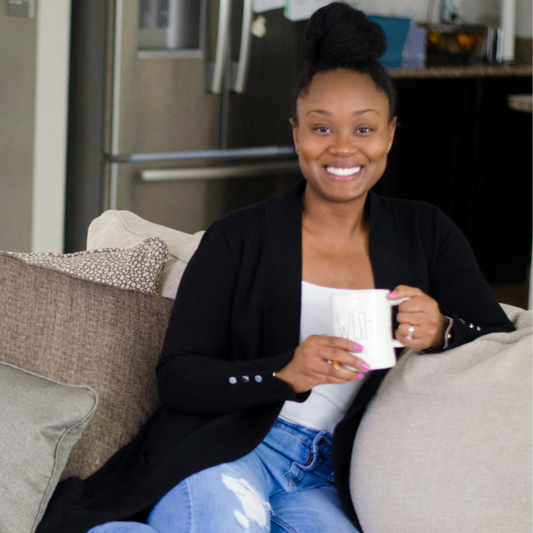 Headshot of Toni-Ann Mayembe, host of the Real Happy Mom podcast