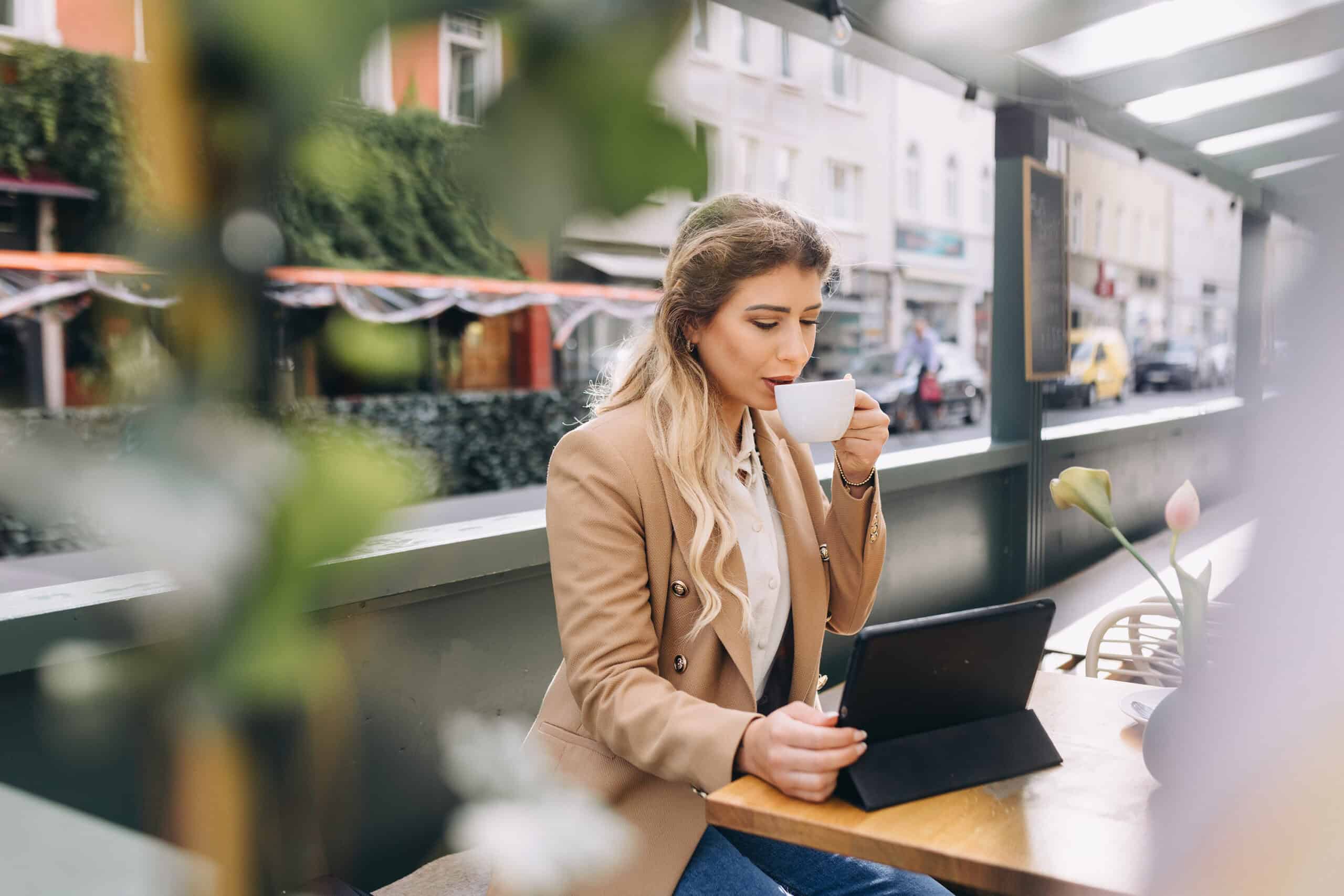 What to do when you lose your passion. Woman working and drinking coffee.