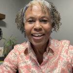 Headshot of Maggie Williams, an online wellness coach for women