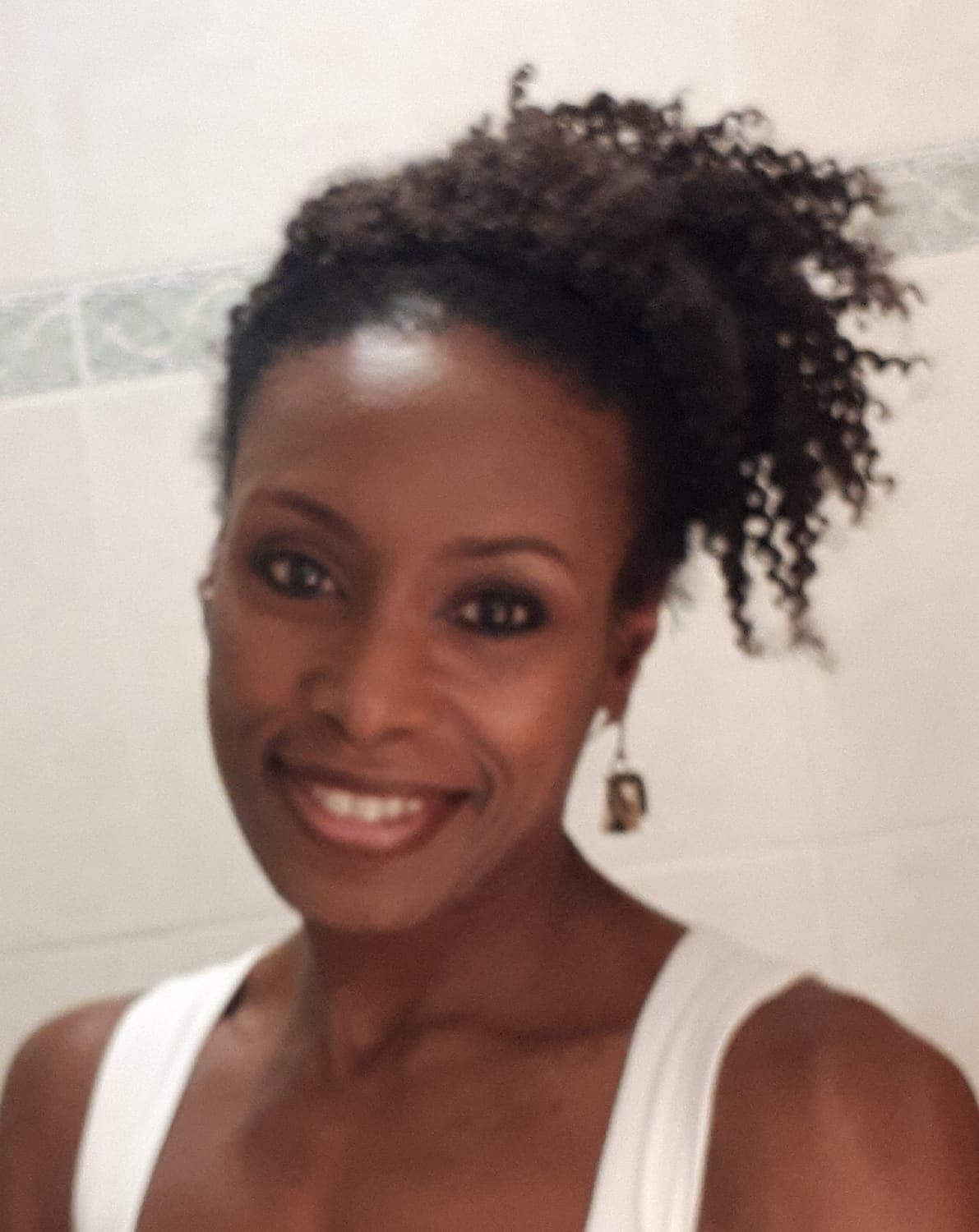 Headshot of coaching client Charmain O from Organized Genie