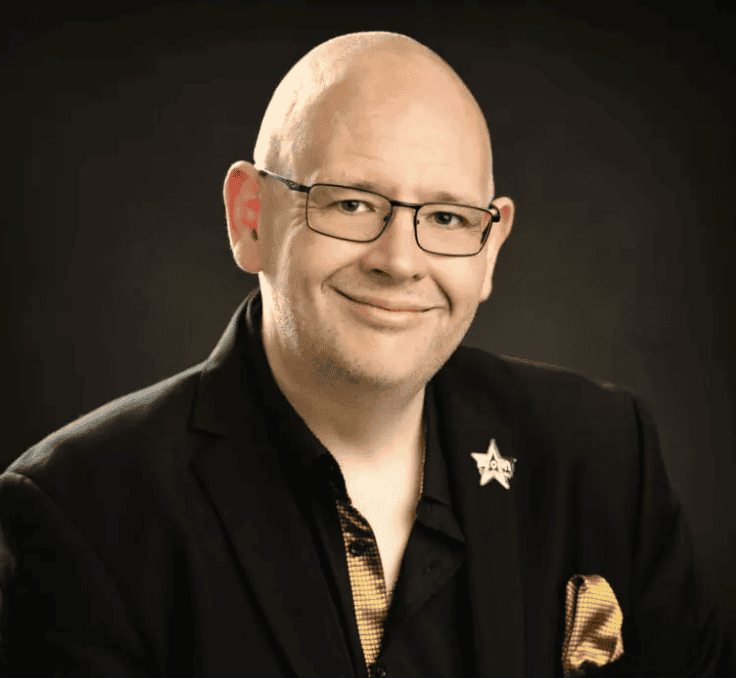 Headshot of Paul Brodie, a publishing coach for entrepreneurs